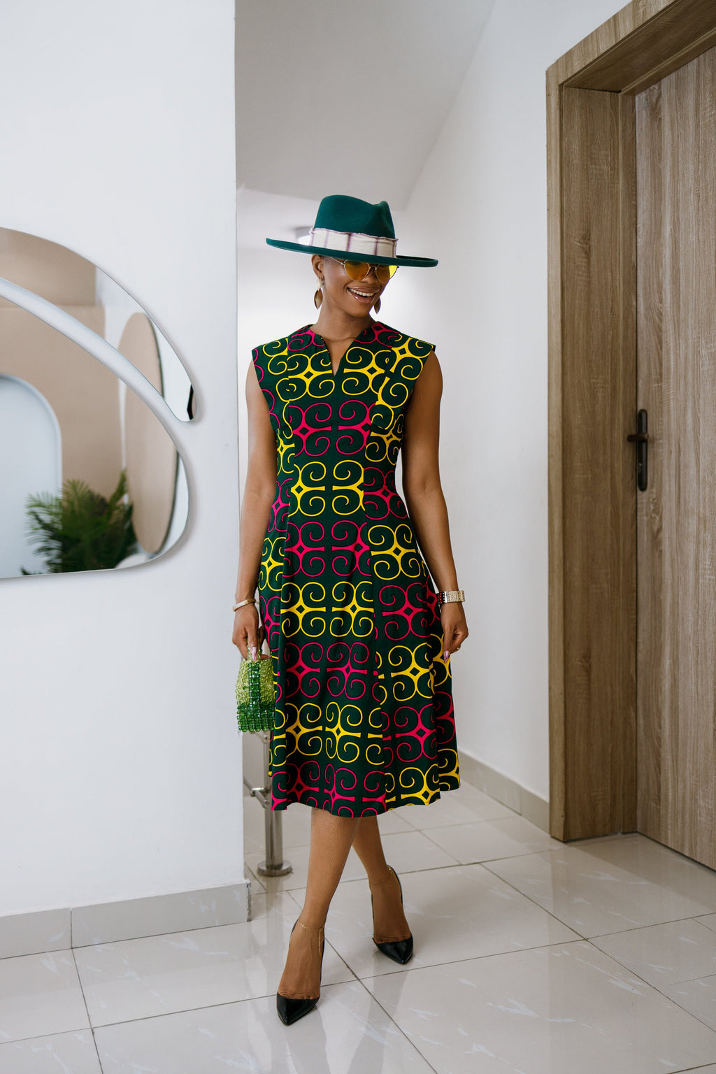 RAISA AFRICAN PRINT SLEEVELESS MIDI DRESS