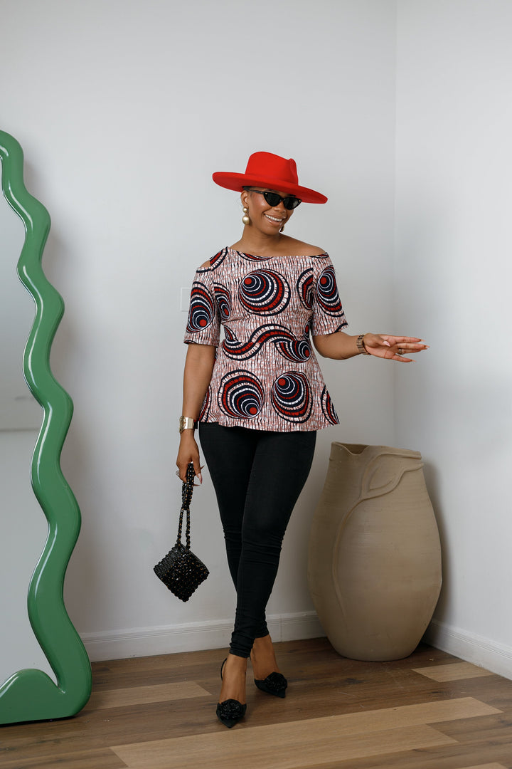 IMARA AFRICAN PRINT ASYMMETRIC PEPLUM TOP [MULTICOLOR]