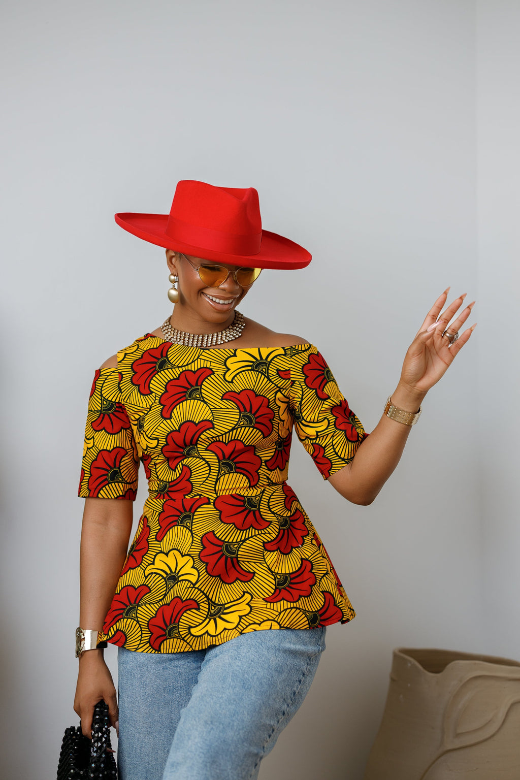 IMARA AFRICAN PRINT ASYMMETRIC PEPLUM TOP [ORANGE]