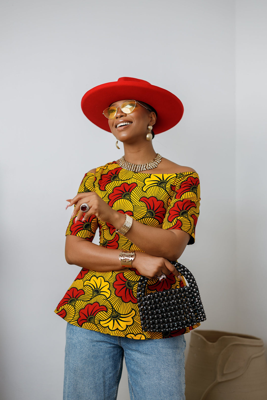 IMARA AFRICAN PRINT ASYMMETRIC PEPLUM TOP [ORANGE]