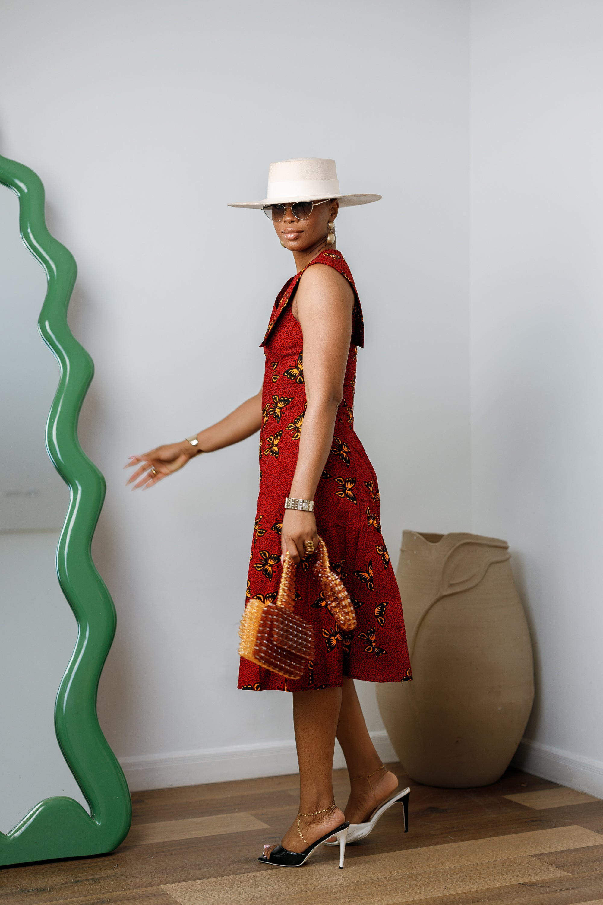 RAISA AFRICAN PRINT SLEEVELESS MIDI DRESS [RED]