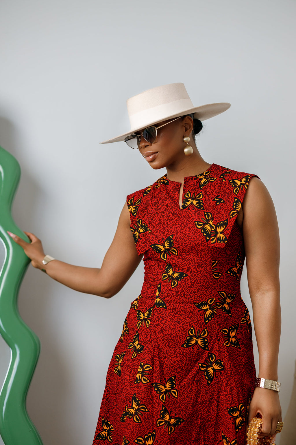 RAISA AFRICAN PRINT SLEEVELESS MIDI DRESS [RED]