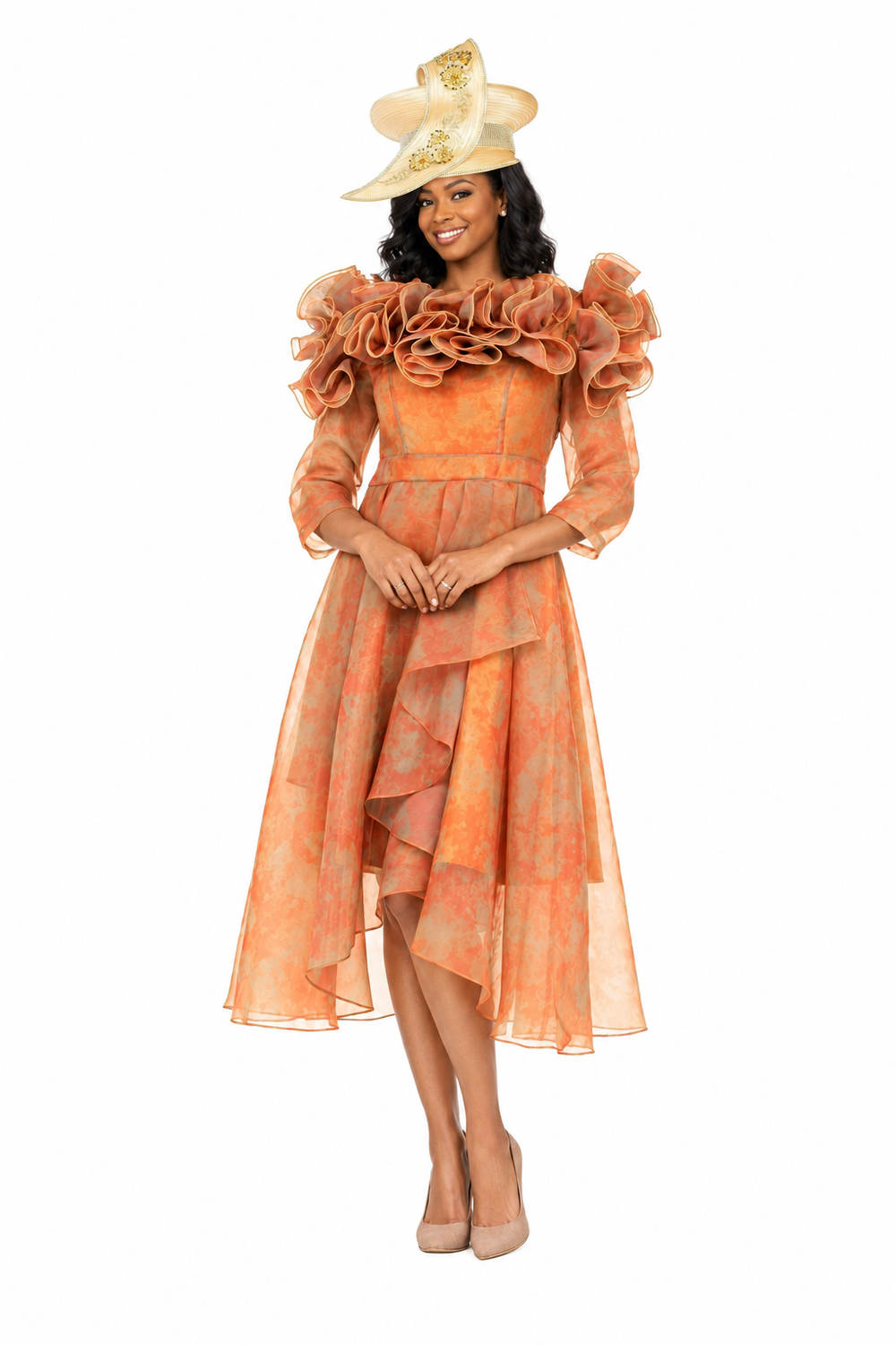 Orange organza dress with cream hat, hands clasped