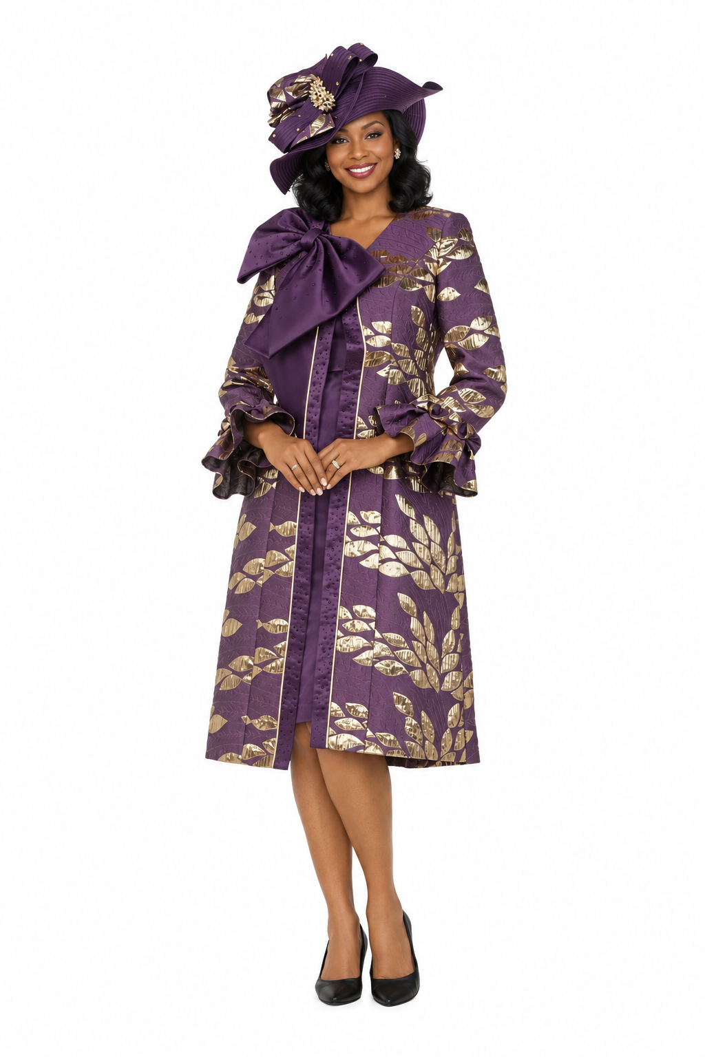 Eggplant and gold brocade jacket dress set, hands clasped